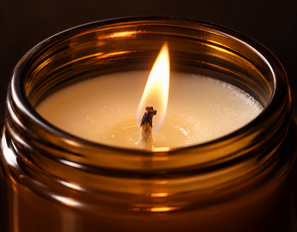 A Moodèra candle burning